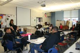 Jobs for Virginia Graduates students participate in a class discussion with a guest speaker. Photo by Iva Quint.
